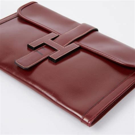 hermes jige leather clutch